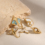 Five gold plated coastal pendant charms