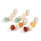 Three-bead earrings with pearly white round tops