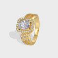 gold plated brass cocktail ring with square clear center stone