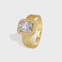 gold plated brass cocktail ring with square clear center stone