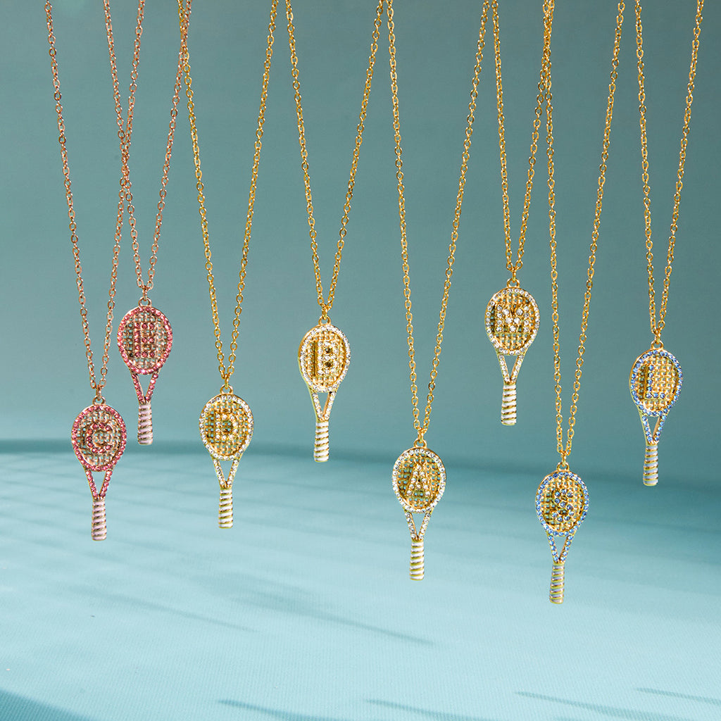Letter-detail racket pendants hanging from chains