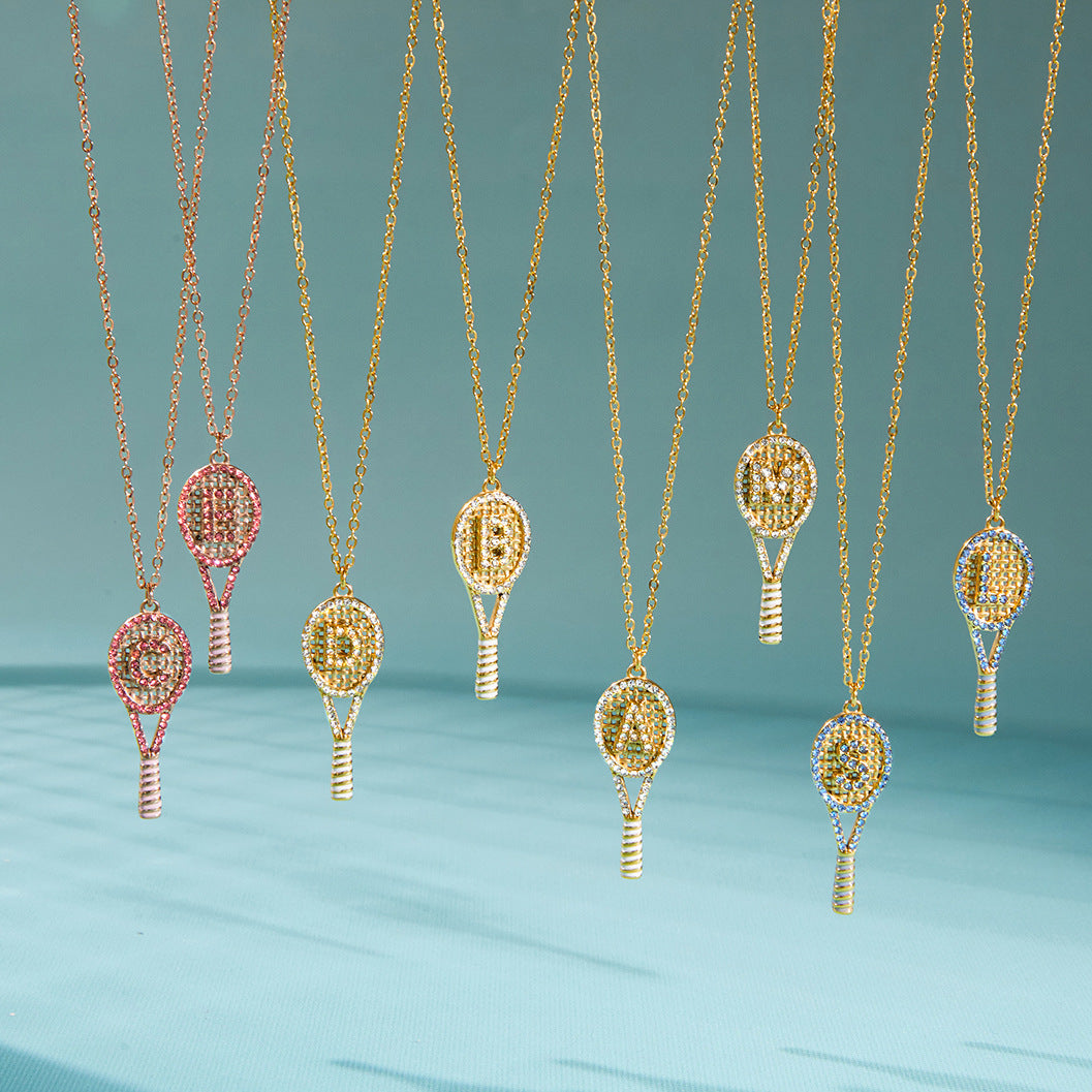 Letter-detail racket pendants hanging from chains