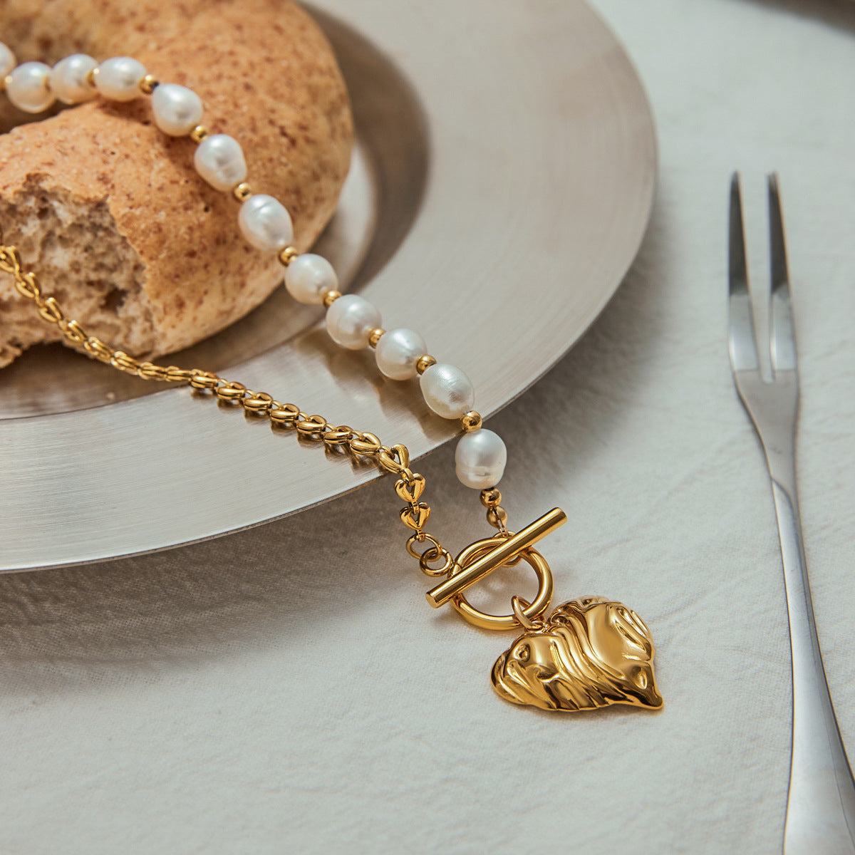 Gold-Tone Pearl-Look Heart Stainless Steel Necklace Collection – flat-lay view