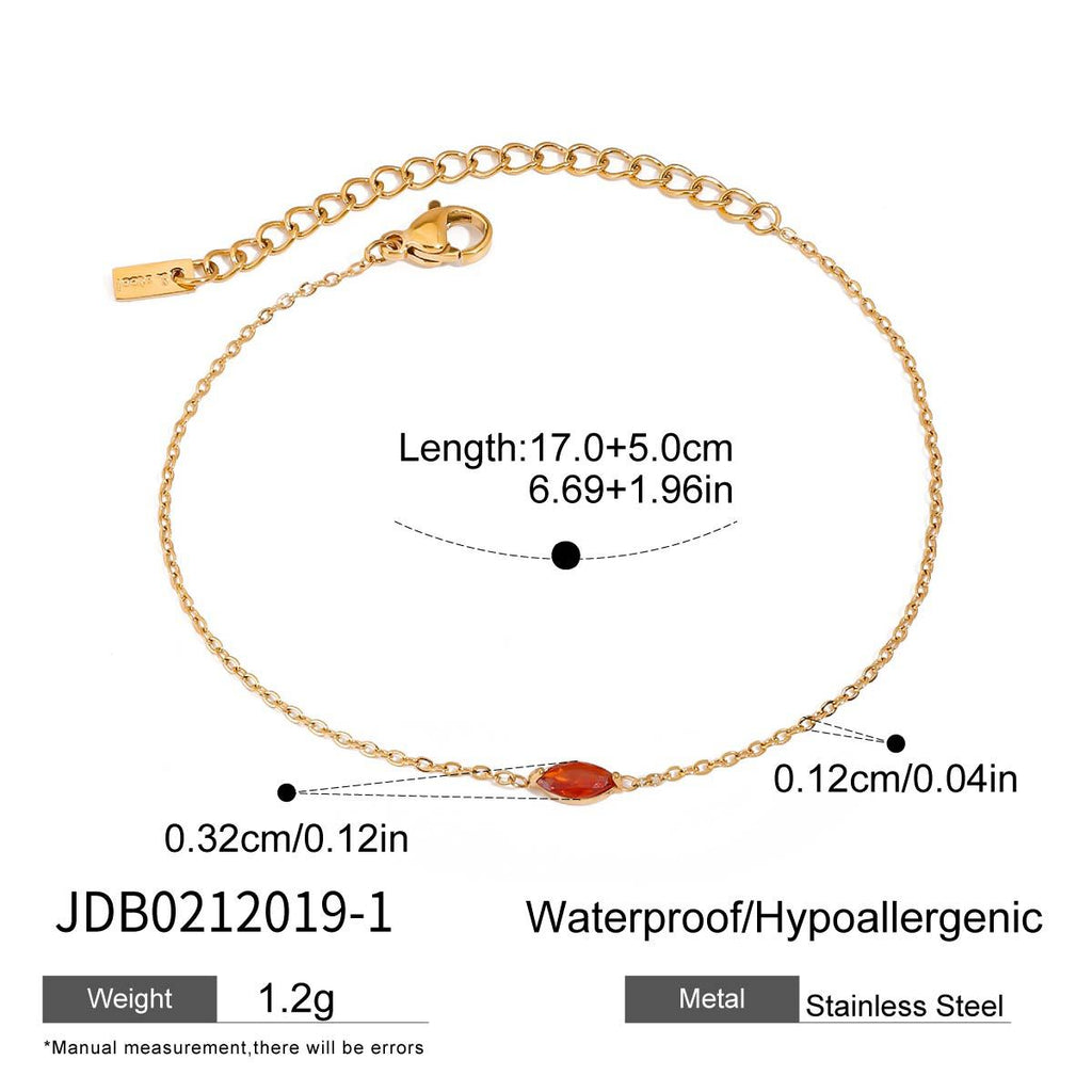 Fine chain bracelet with red marquise accent