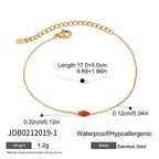 Fine chain bracelet with red marquise accent