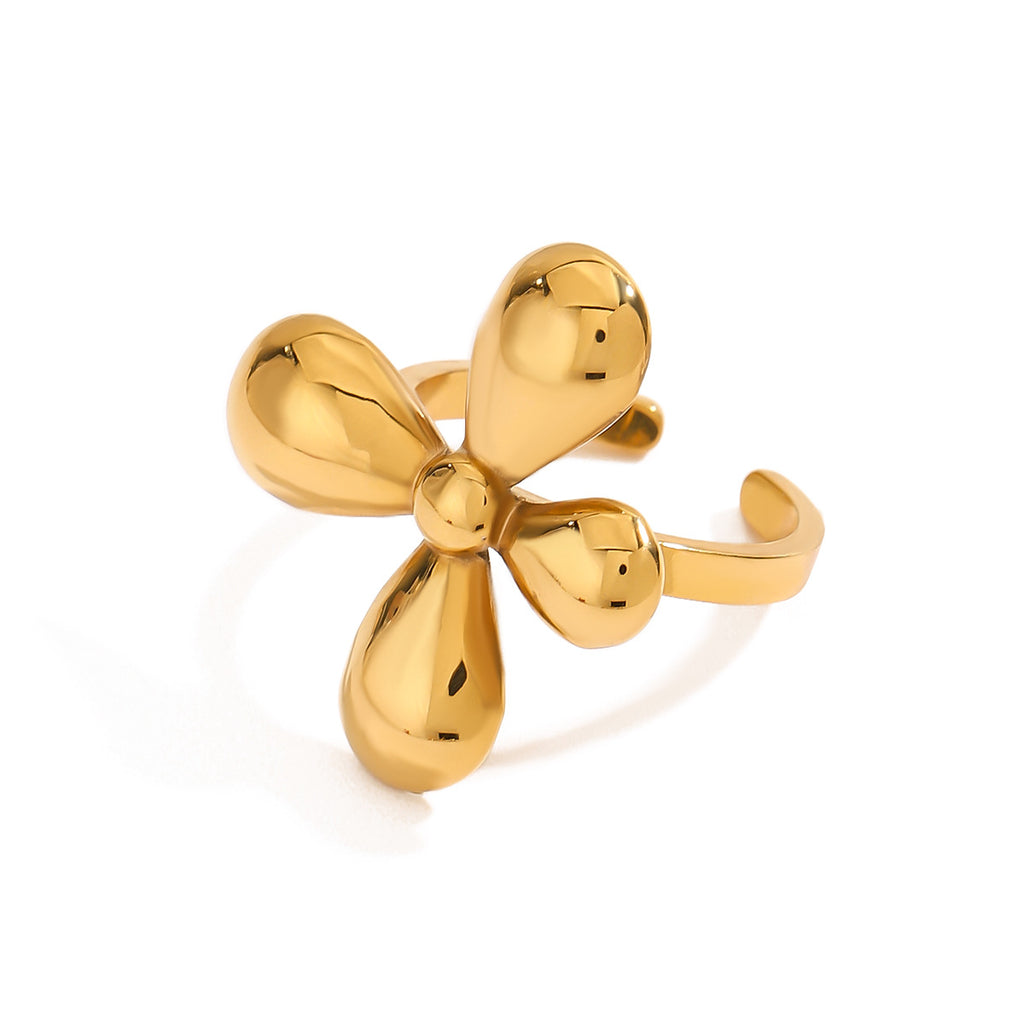 Open-band stainless steel flower ring on white