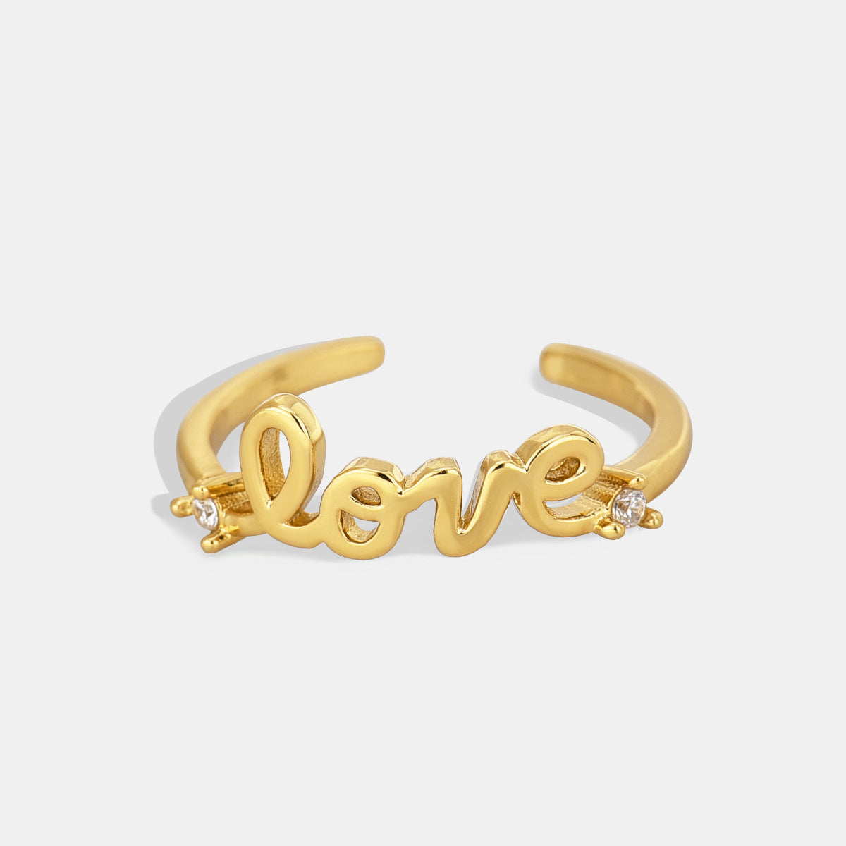 gold plated brass LOVE script open ring with clear stone accents