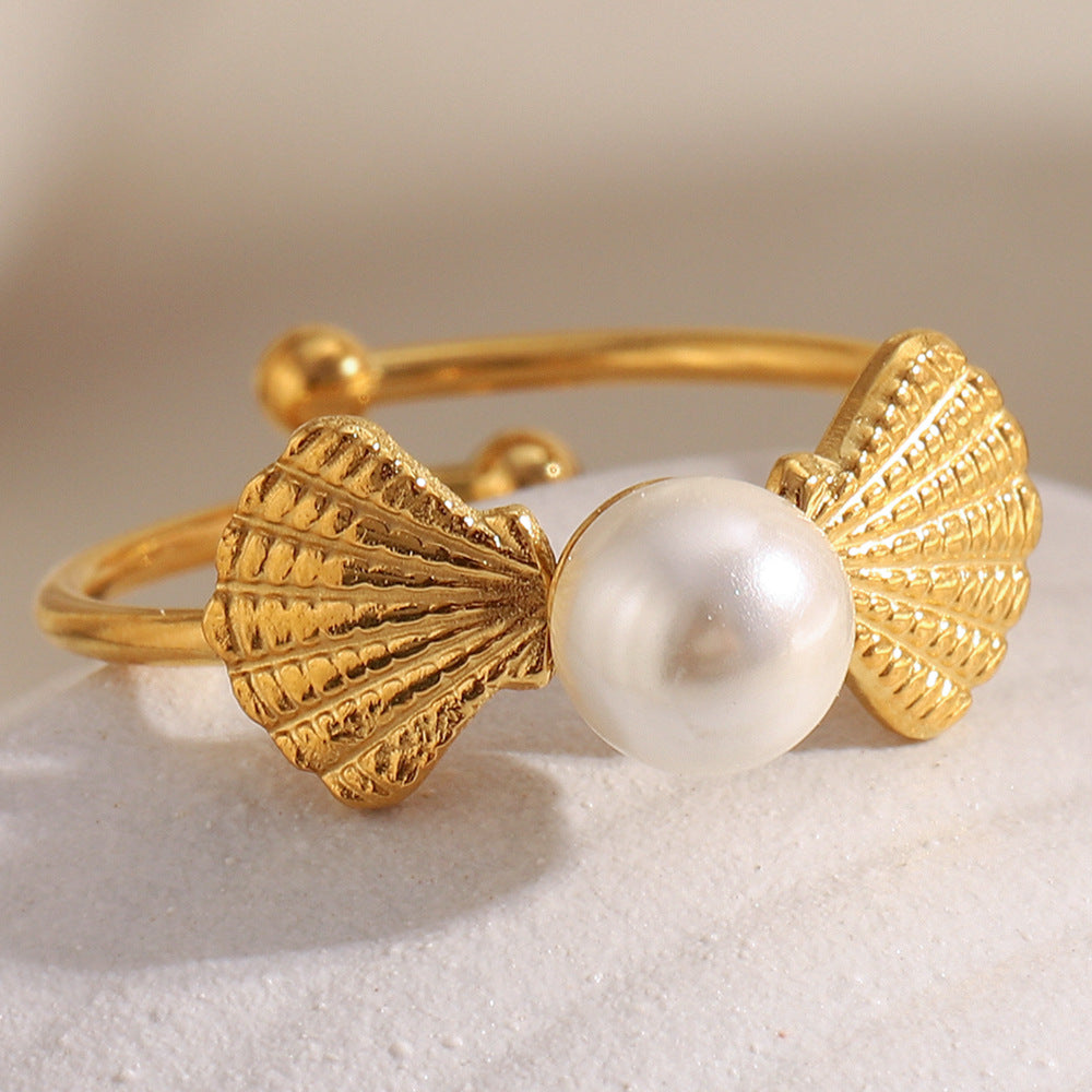 gold plated shell open ring with a round white imitation pearl