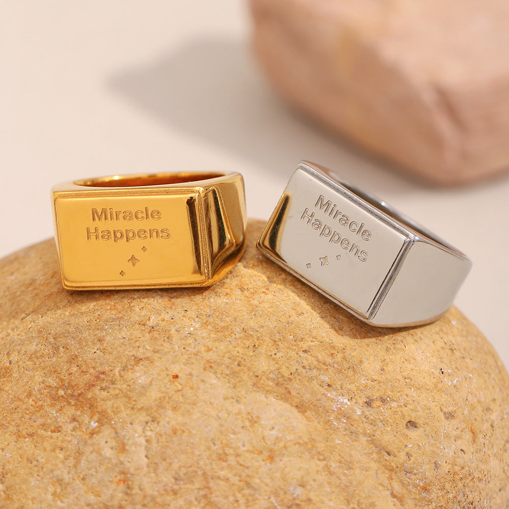 gold plated and silver stainless steel Miracle Happens signet rings