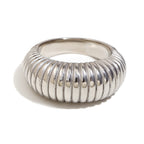 isolated silver-finish stainless steel ribbed tapered dome ring