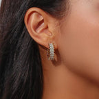 Rectangular zirconia open hoop worn on an ear