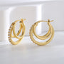 gold plated triple hoop clear stone earrings in an upright studio view