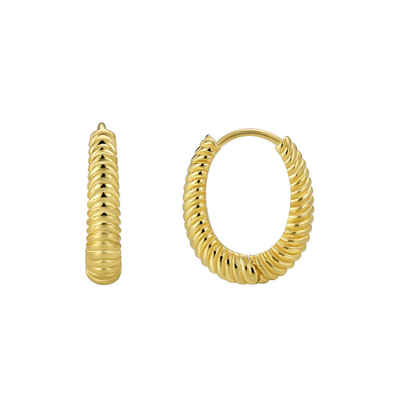 front and side view of compact twisted gold plated hoops