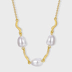 gold plated brass necklace with three gray shell pearls