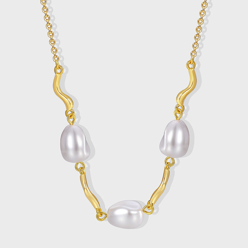 gold plated brass necklace with three gray shell pearls