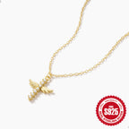 angled view of 925 silver angel wing pendant on cable chain