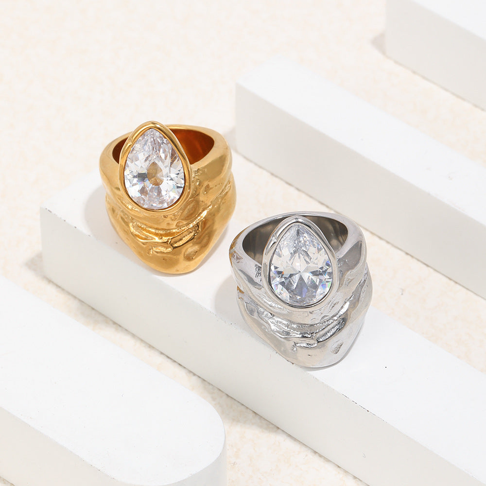 gold plated and silver-finish pear-cut rings viewed from above