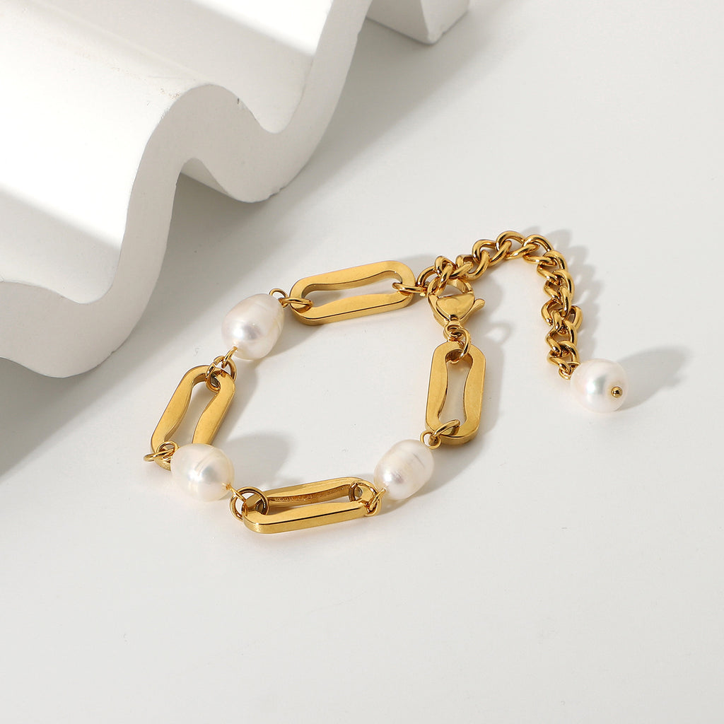 styled view of gold plated pearl link bracelet with extender