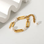 styled view of gold plated pearl link bracelet with extender