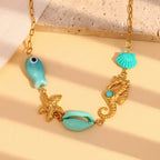 Gold plated stainless steel ocean charm station necklace front view