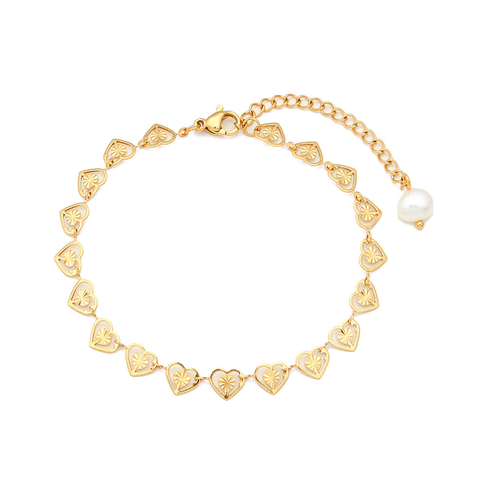 matching heart bracelet with extension chain and white bead drop