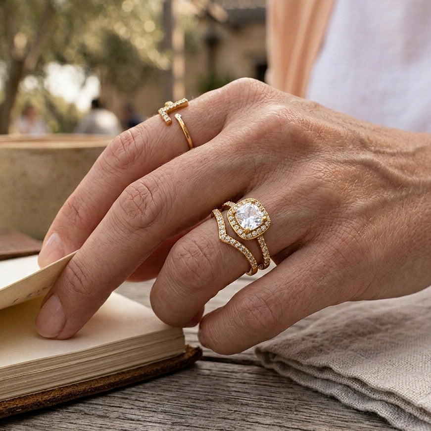 Halo ring styled with a separate slim stone band