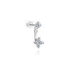 clean isolated view of a silver moissanite flower ear jacket earring