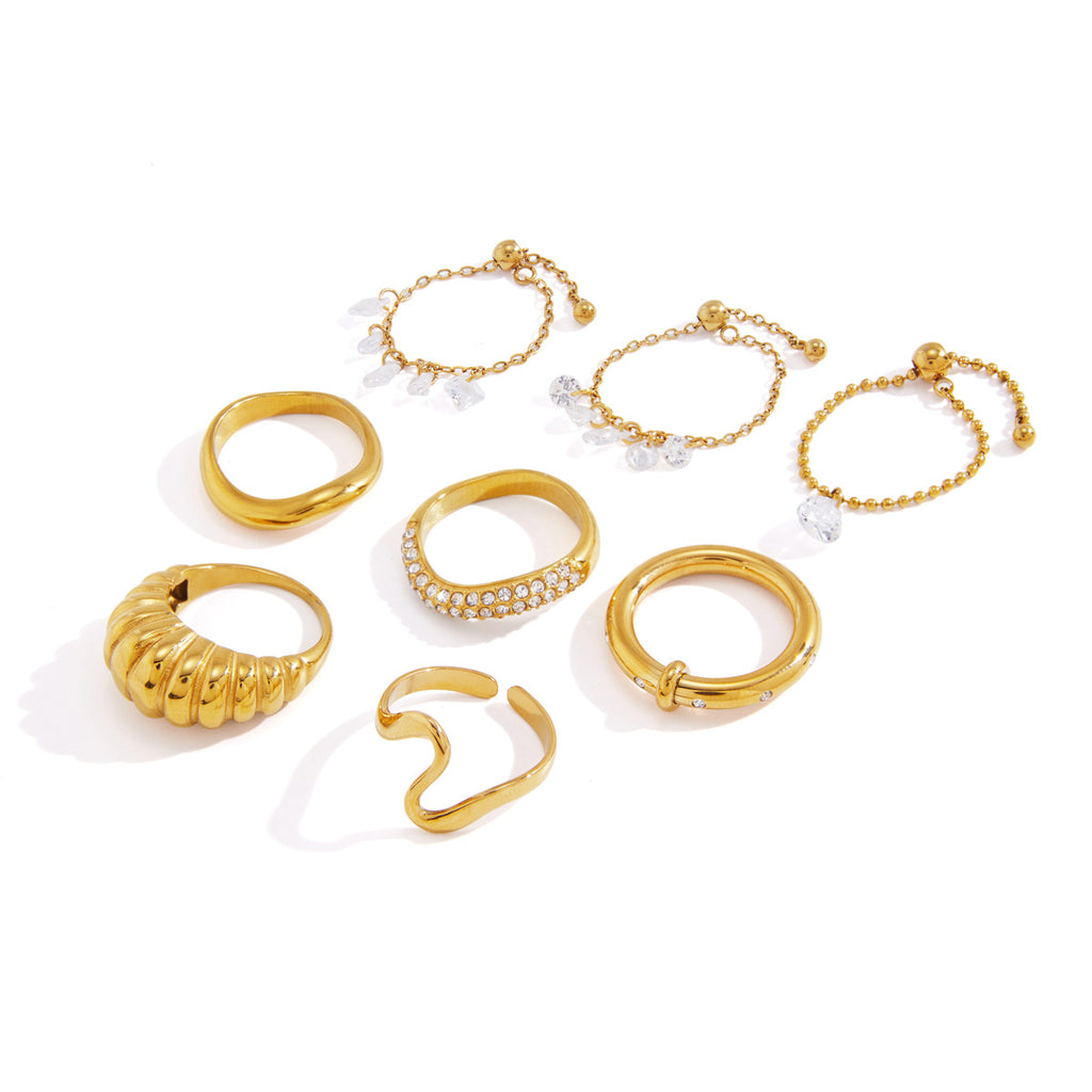 Gold tone ring assortment on white