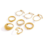 Gold tone ring assortment on white