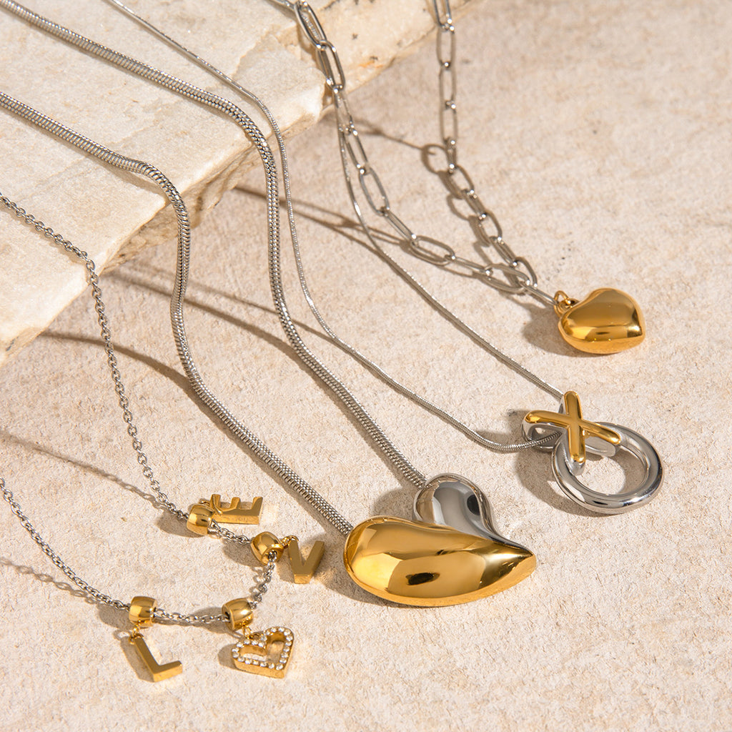Mixed-Finish Stainless Steel Heart Necklace Collection close-up product view