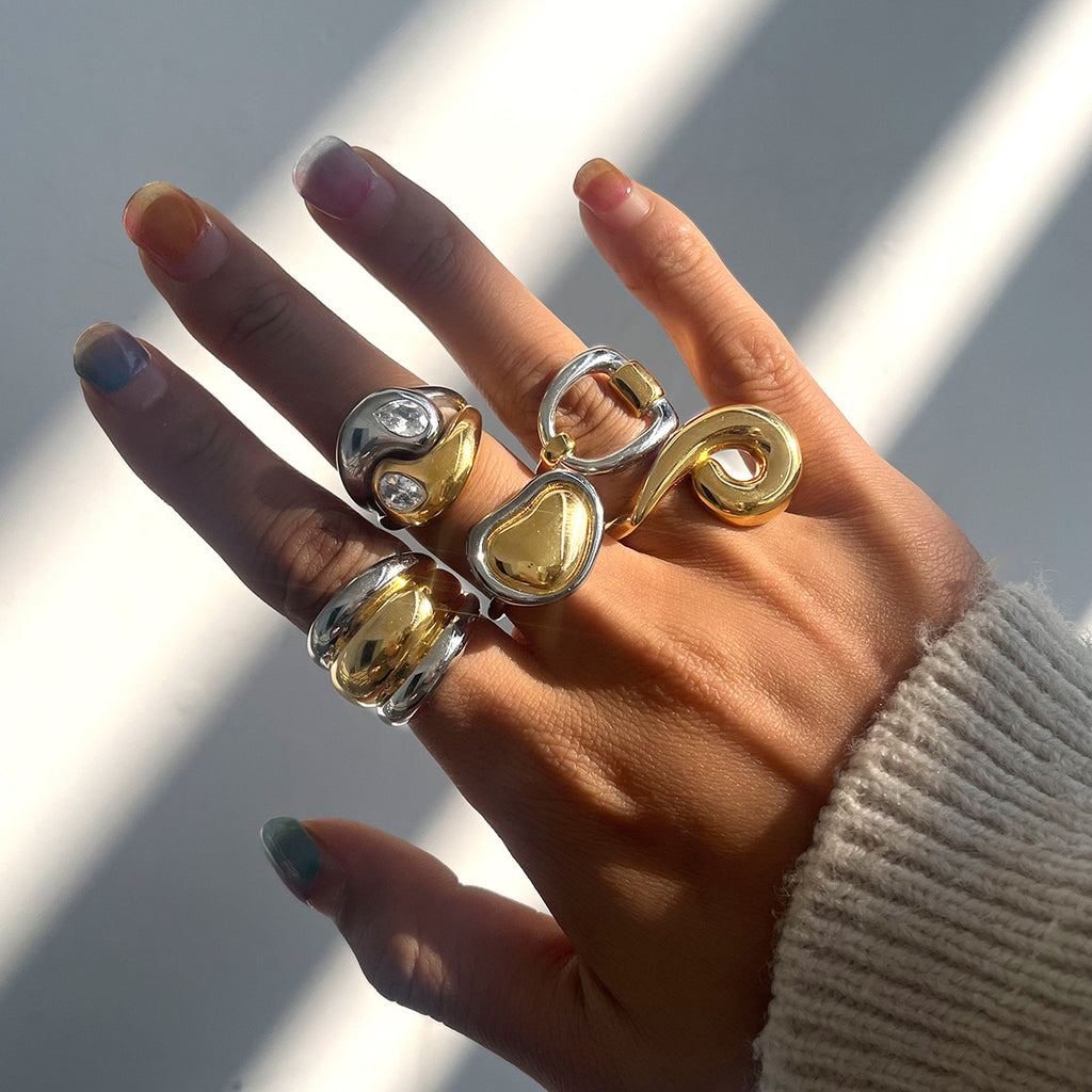 Two-Tone Sculptural Stainless Steel Ring Collection shown on model