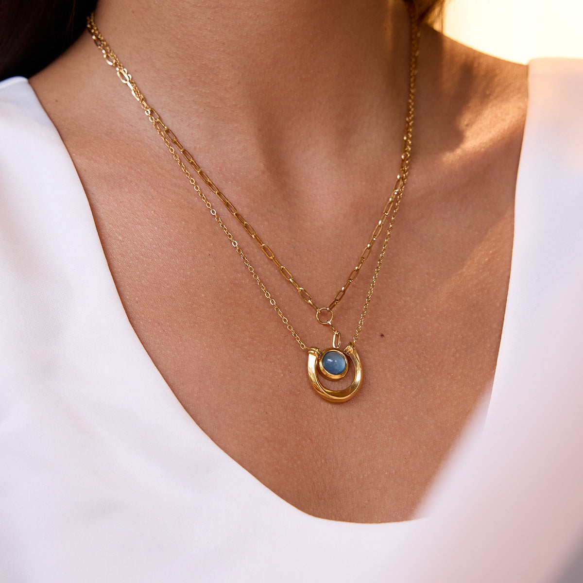 Gold Tone Blue Cabochon Stainless Steel Equestrian Necklaces — crescent blue cabochon necklace option