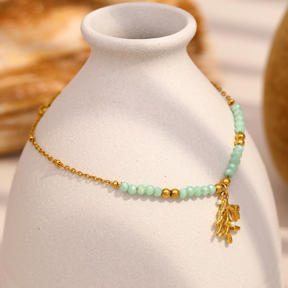 Aqua bead necklace close-up on display bust
