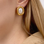 Gold Tone Pearl-Look Stainless Steel Oval Stud Earrings — front view of the oval studs