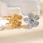 gold plated and silver-finish stainless steel flower rings with green stones