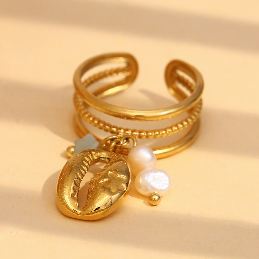 front angle of the textured triple-band charm ring