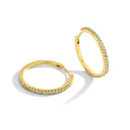 open hinged gold plated hoops with outer zirconia rows