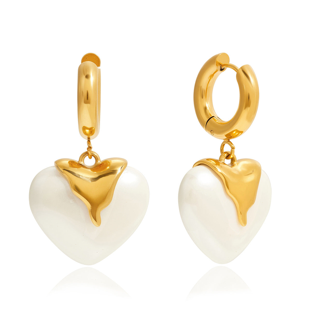 front and side view of the ivory pearlized resin heart earrings