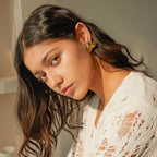Two-Tone Textured Triangle Stainless Steel Stud Earrings shown on model
