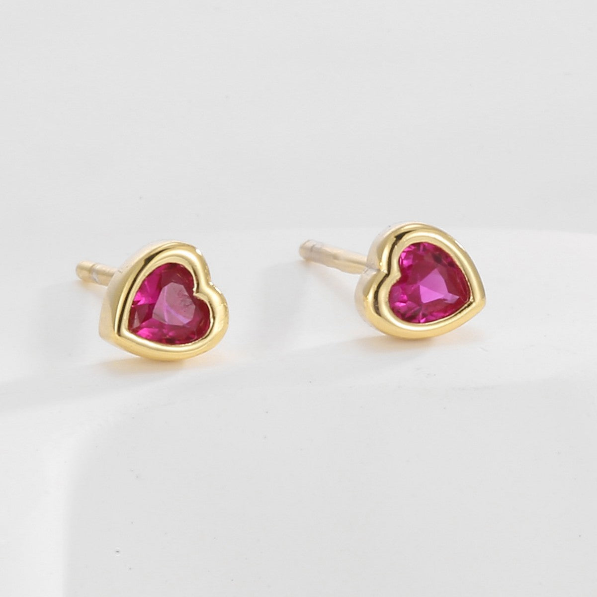 Gold Plated 925 Sterling Silver Red Heart Zirconia Stud Earrings — pair with red hearts in gold settings