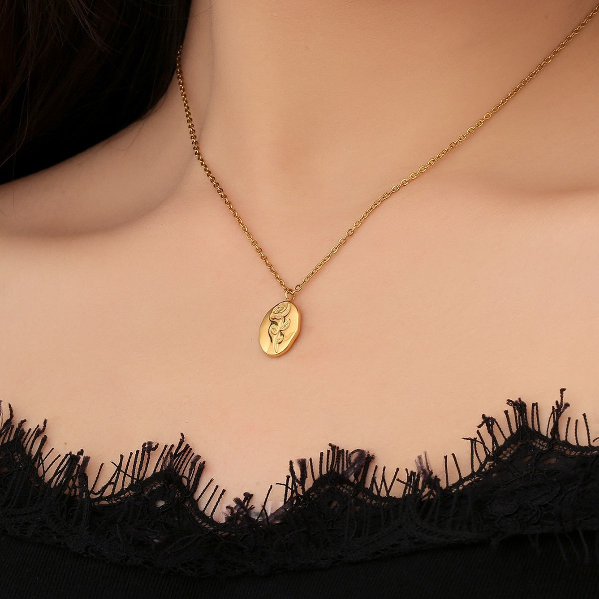 model wearing the petite gold plated rose medallion necklace