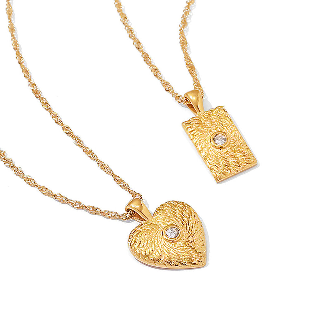 Textured heart and rectangular pendants with small center accents