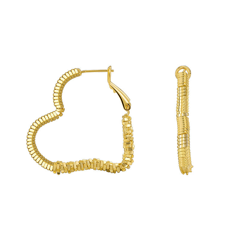 front and side view of gold plated coiled heart earrings