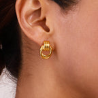 Stainless Steel Interlocking Loop Stud Earrings in Two Finishes on-model view