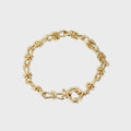 isolated gold plated brass chain bracelet with bow-knot link wraps