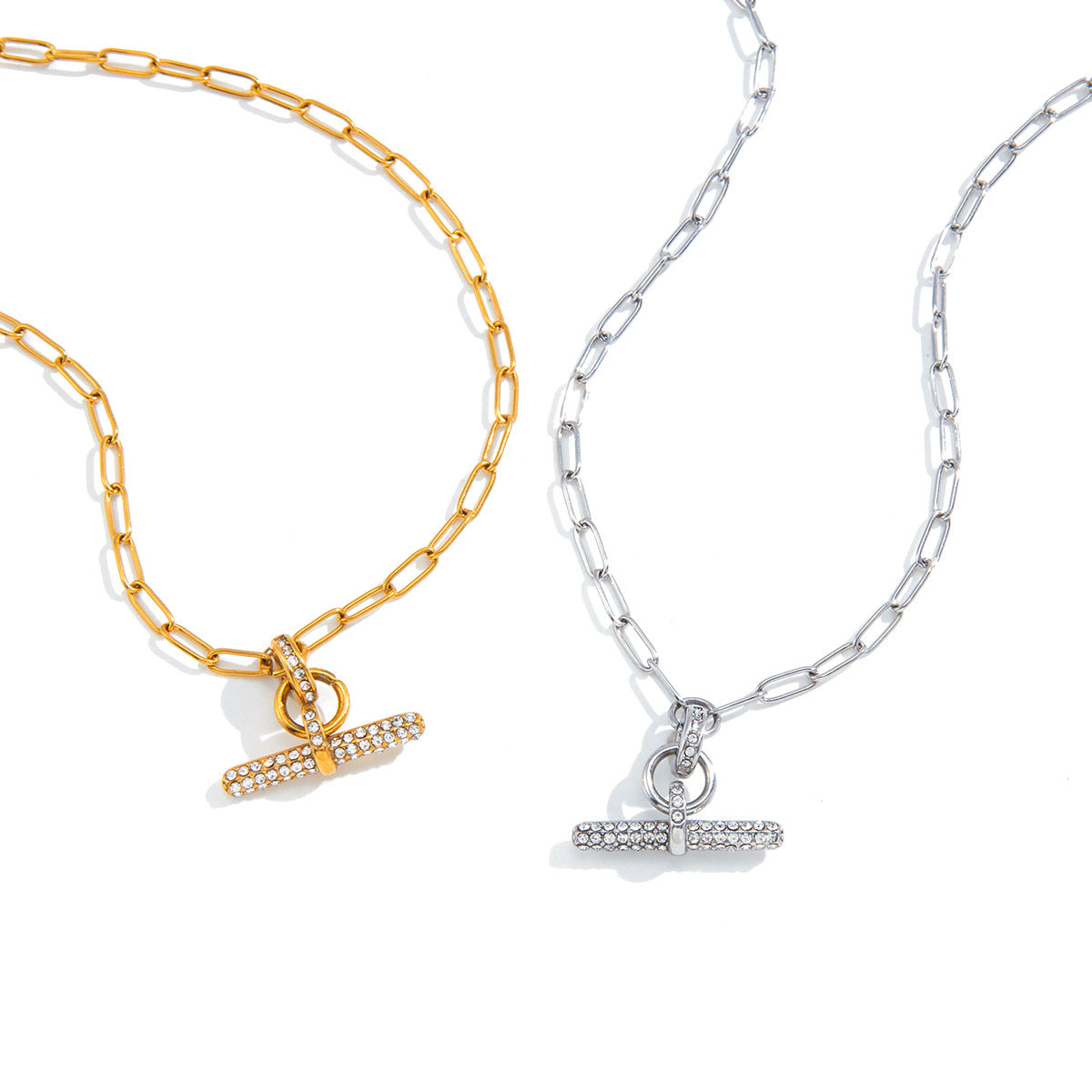 Both paperclip necklace finishes on white