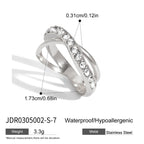 Crossover ring with polished and clear-accent bands