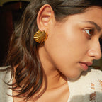 Gold-Tone Stainless Steel Shell and Spiral Stud Earring Collection — styled view