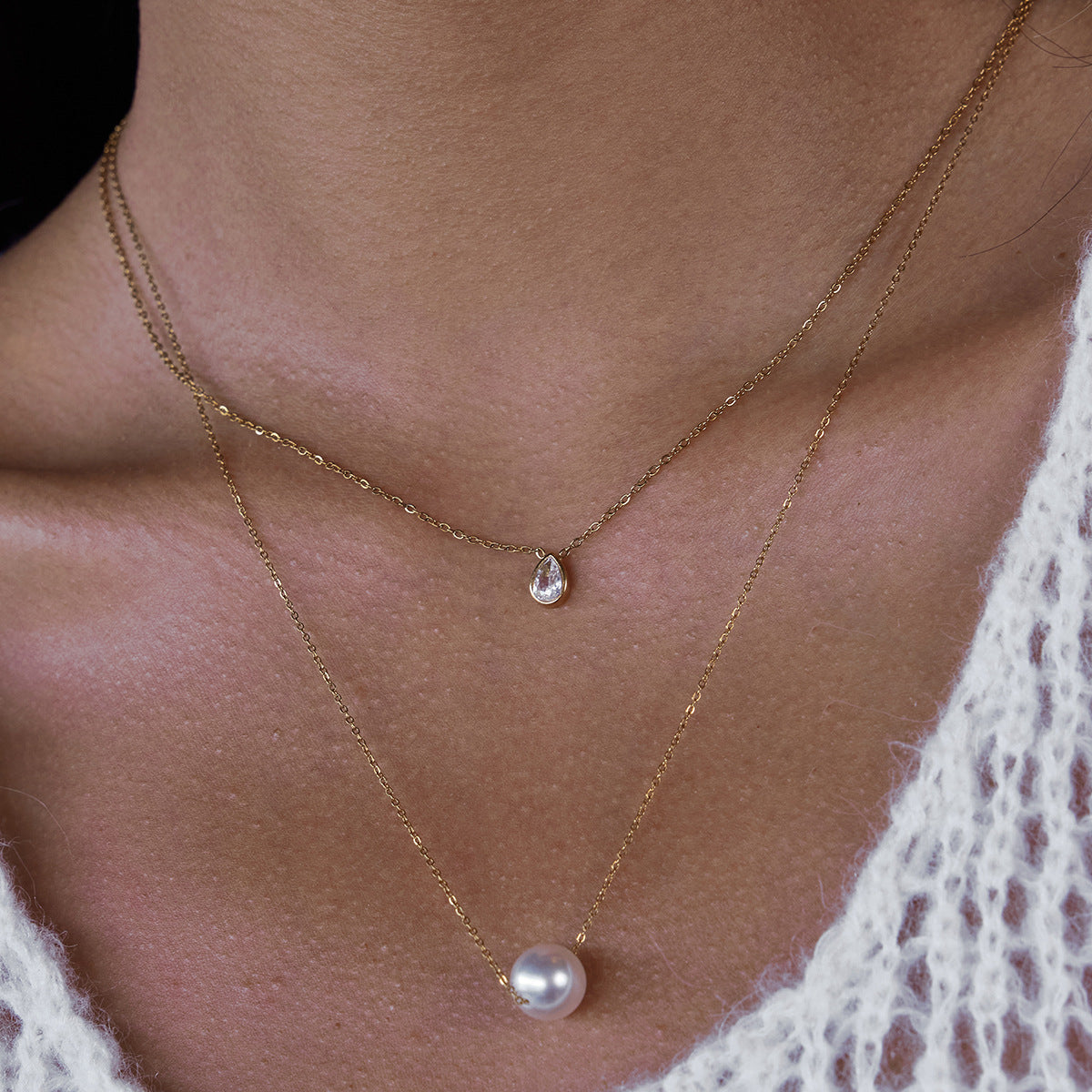 Gold-Tone Clear Accent Stainless Steel Pendant Necklace Collection close-up product view