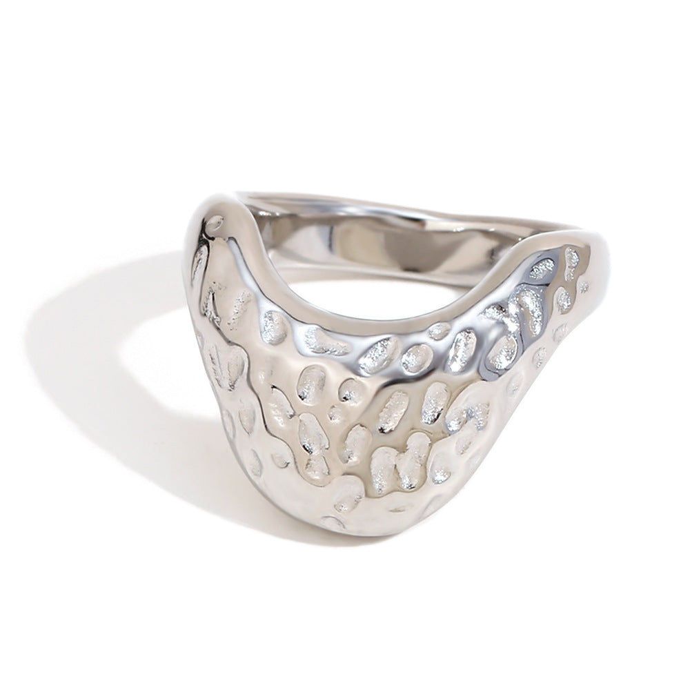 isolated silver-finish hammered cutout signet ring